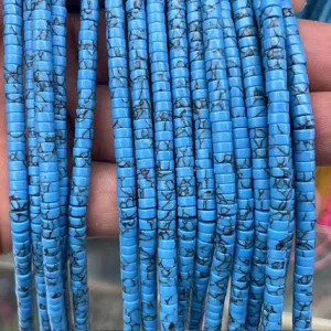 Detail shot of blue tube spacer beads with black web pattern, 2x4mm DIY jewelry making.