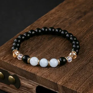 Braccialetto di perle in agata nera e cristallo blu per uomo e donna, gioiello da polso elegante.