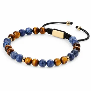 Tiger eye and blue stone men's beaded bracelet detail with adjustable black braided cord.