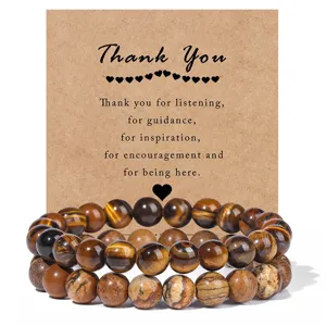 Detailed close-up view of double-layer gemstone bead bracelets displayed on a brown kraft card.