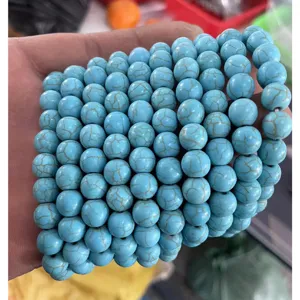 Turquoise blue gemstone beaded detail showing 8mm crackled texture round beads for crafts.