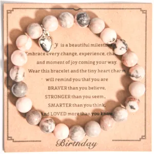 Pulsera de cuentas de piedra natural rosada con dije de corazon para regalo ideal.