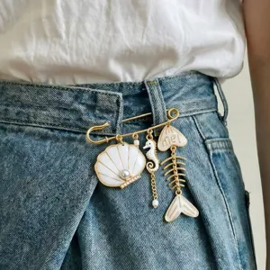 Vintage multi pendant safety pin brooch with shell and fish bone design for fashion women.