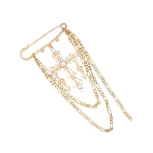Broche retro dorada de cruz con perlas, cadenas multicapa y imperdible para mujeres.
