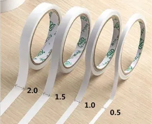 Ruban adhésif double face blanc vue détaillée montrant diverses options de largeur de 0,5 à 2,0.