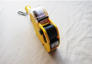 Detail view of the yellow single-line price labeler gun showing its durable mechanical body.