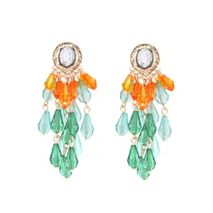 Elegant multi-tiered beaded dangling earrings with vibrant orange green crystal charms.