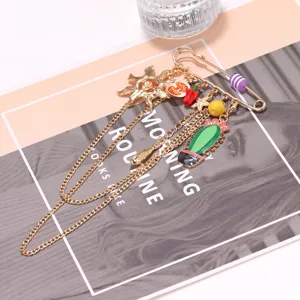 Sweet and cute cactus sun charm brooch with metal tassels, trendy fashion accessory.