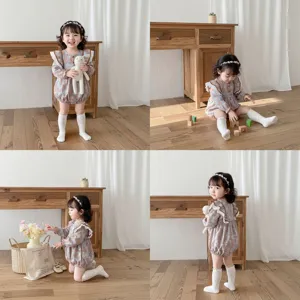 Cute floral baby girl long sleeve romper with lace ruffles, stylish spring infant jumpsuit.