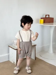 Toddler summer romper detail, cute doll collar and check splice design, soft breathable fabric.