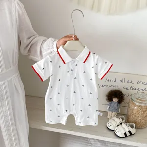 Cute baby boy short sleeve romper with polo collar and anchor print for summer wear.
