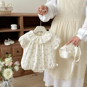 Baby summer cotton floral short sleeve romper with lace collar and matching bonnet set detail.