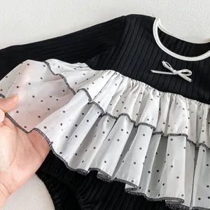 Baby girl long sleeve romper, black knit bodysuit with white polka dot mesh tutu skirt.