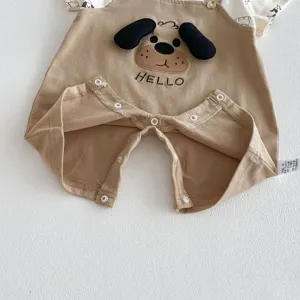 Detail view of baby romper featuring cute 3D puppy face and convenient snap closure.