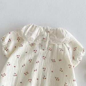 Infant baby girl cotton gauze short sleeve romper detail, white lace collar with red floral.
