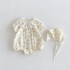 Infant summer cotton floral romper with lace collar and matching bonnet for newborn baby.