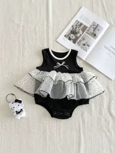 Charming summer baby girl sleeveless romper with cute bow and polka dot mesh skirt for infants.
