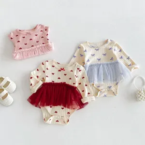 Schattige baby lange mouw rompertje jurk set met mooie tule rok en schattige strikjes.