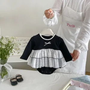 Cute baby girl long sleeve romper with mesh tutu skirt and polka dots. Perfect autumn outfit.