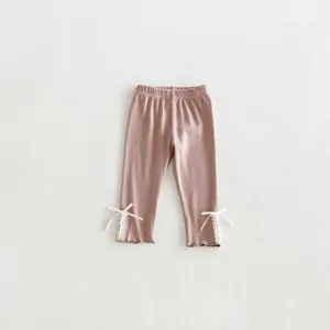 Roze meisjes legging met schattige witte kanten strik, comfortabele peuter herfst broek.