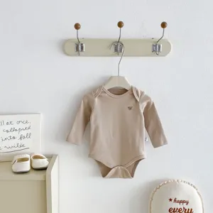 Cozy cotton baby romper in neutral khaki, long sleeve essential for infants spring autumn.