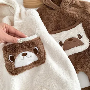 Detailed view of cozy baby plush fleece hooded romper featuring cute bear pockets for winter.