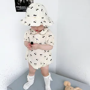 Cute baby girl cherry print short sleeve romper and matching bucket hat for summer.
