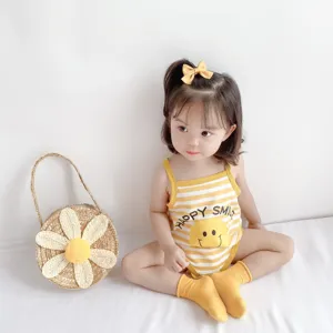 Cute baby romper with yellow stripes and smiling face, soft cotton summer infant clothing.