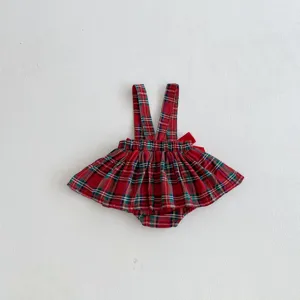 Cute baby girls red plaid suspender skirt romper with adorable bow detail for daily wear.