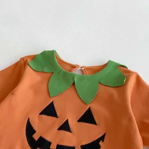 Detailed close-up view of baby Halloween pumpkin long-sleeve bodysuit with cute leaf collar.