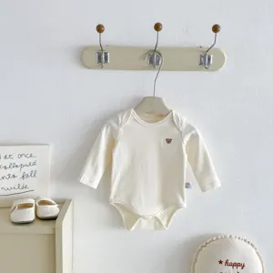 Pure cotton baby onesie for autumn, long sleeve creeper in off-white for newborns and infants.