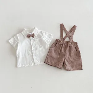 Baby boy summer short-sleeve shirt and plaid suspender shorts two-piece outfit set.