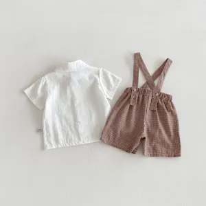 Baby boy summer clothing set, white short sleeve shirt and brown plaid suspender shorts.