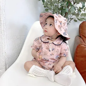 Cute baby girl summer short sleeve floral romper bodysuit with matching sun hat and socks.