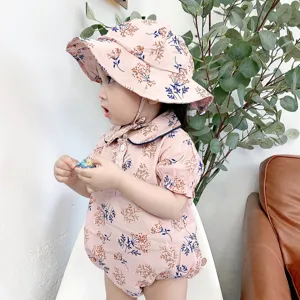 Adorable baby floral romper and hat set, breathable cotton summer outfit for infant girls.