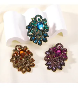 Detailed view of vintage crystal brooch, elegant alloy rhinestone corsage for coats and suits.