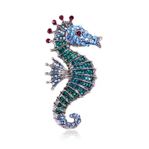 Exquise broche hippocampe en cristal, élégant bijou mode animaux de mer pour femmes.