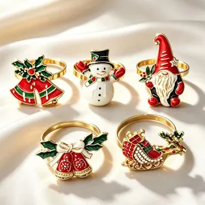 Detailed view of 5pcs Christmas alloy napkin rings featuring cute snowman, santa, and bells design.