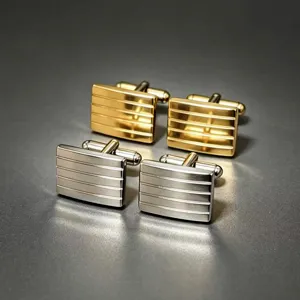 Conjunto de gemelos rectangulares a rayas con acabado dorado y plateado para hombres.