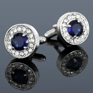 Detailed shot of round blue crystal zircon halo cufflinks for formal French shirts and suits.