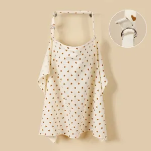 Detail view of the soft cotton nursing cover featuring adjustable D-ring and heart print.