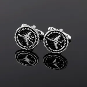 Vintage metal airplane cufflinks for men, retro gear jet design suit shirt buttons detail.