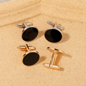 Klassische runde Herren Manschettenknöpfe in Silber und Gold mit schwarzer Einlage für Hochzeiten.