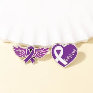 Purple ribbon angel wing and heart survivor brooch pin for breast cancer awareness and support.