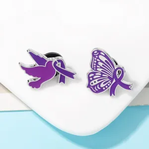 Enamel purple ribbon brooch set featuring a dove and butterfly design for awareness campaigns.