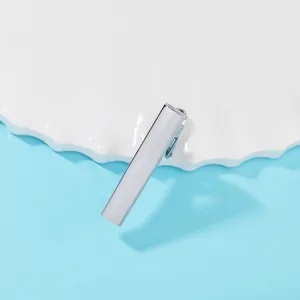 Stainless steel men's minimalist tie clip, elegant silver business shirt accessory detail.