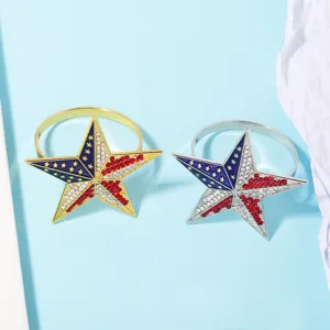 Detailed close-up of US flag rhinestone star napkin rings, alloy metal table decor set.