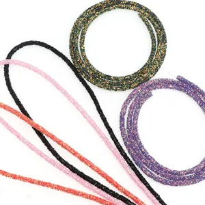 Detail shot of colorful glitter tubing DIY accessories, perfect for hair clips, shoes, and crafts.