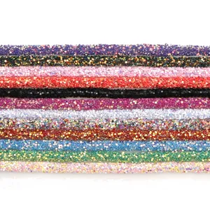Close-up of colorful rhinestone glitter tubes for DIY shoes, hair clips, and craft accessories.