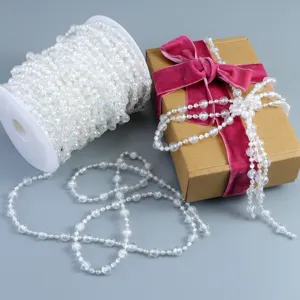 Translucent iridescent bead garland spool for wedding decor, craft DIY and party decoration.